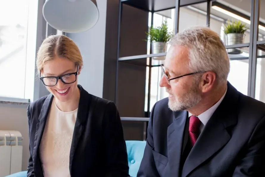 Attorney going over paperwork with a client